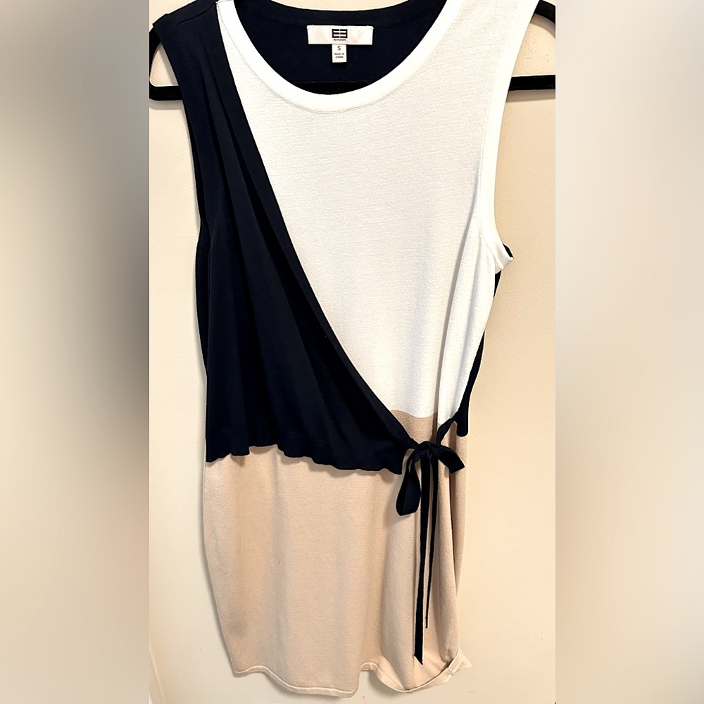 Small Etcetera knit wrap dress. Stretchy, mid-length. Navy, cream & white.